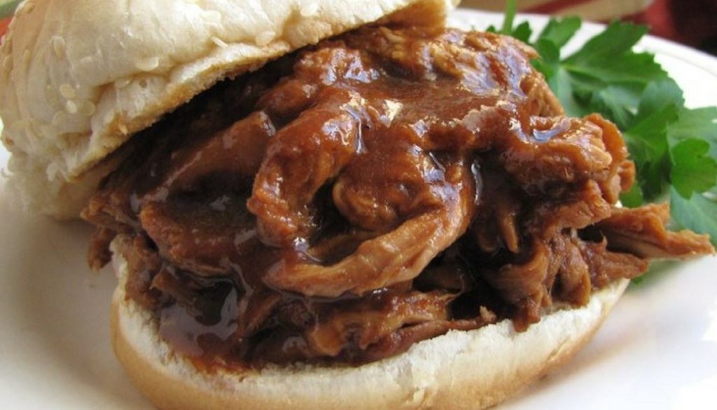 Texas slow roasted pulled pork served on a toasted bun